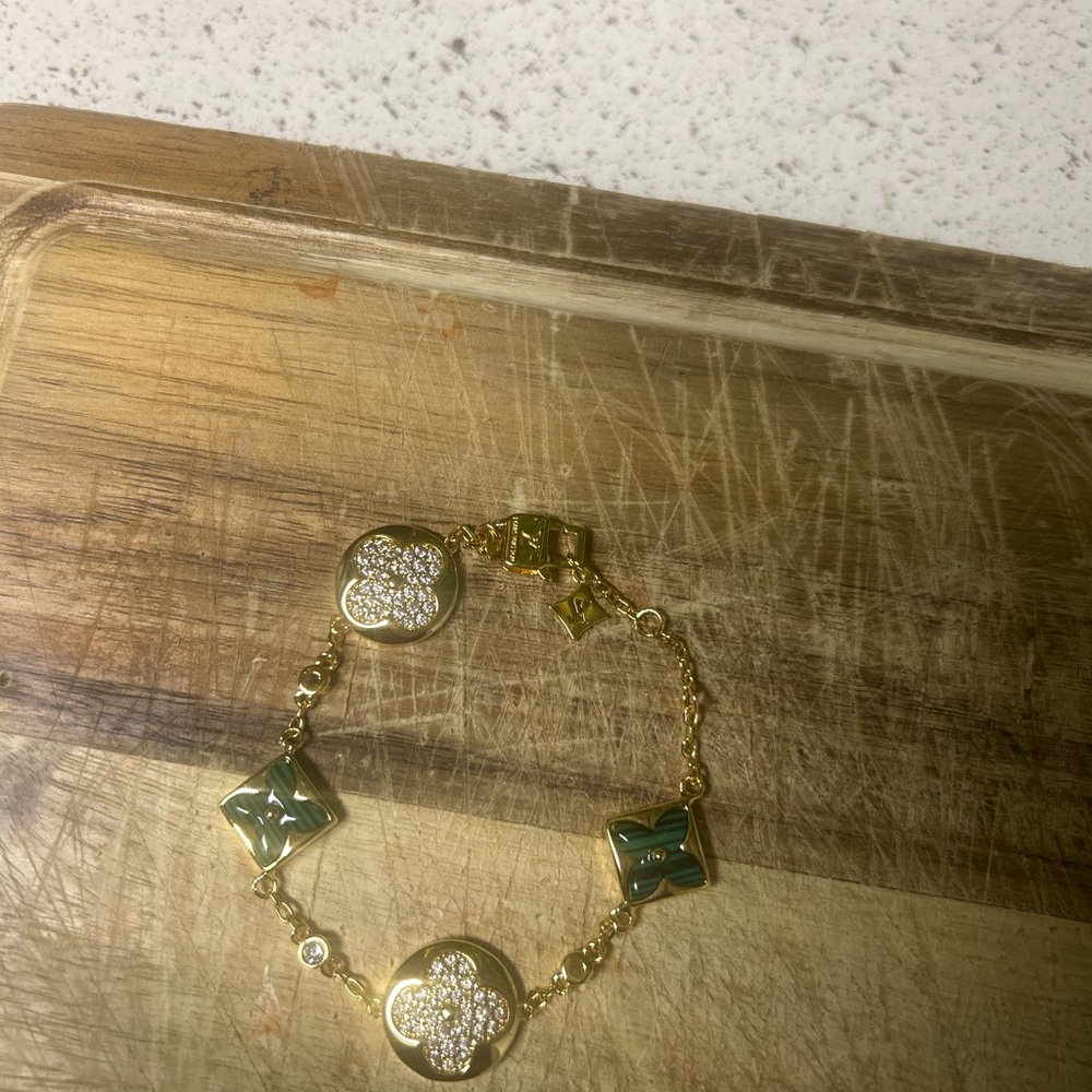 Louis Vuitton Gold-Tone Bracelet with Green Enamel Motifs